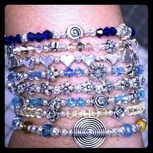 Expandable beaded bangle. $15 each or 3/$35.